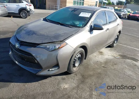 2017 Toyota Corolla Le z USA, uszkodzony, nr VIN 5YFBURHE4HP608414